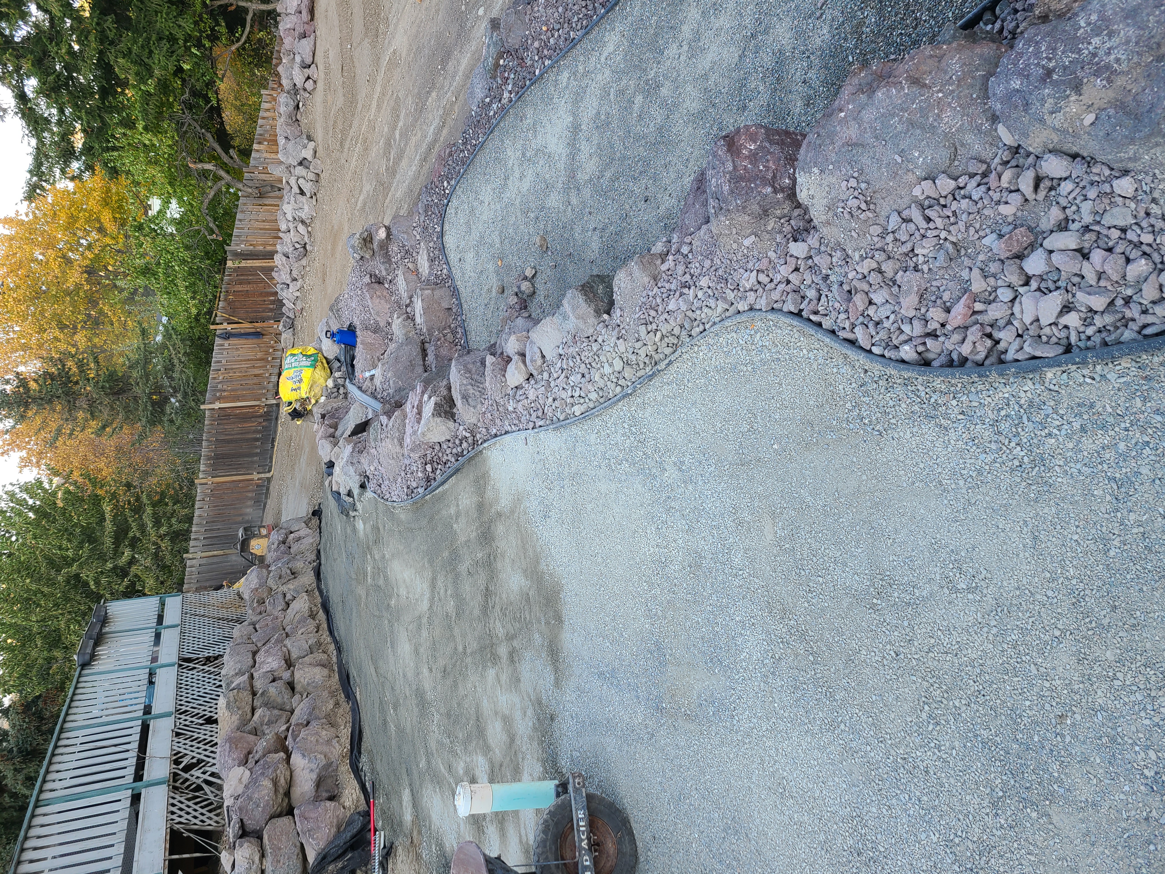 Terraces Parkview Drive, dig and backfill, rock retaining wall