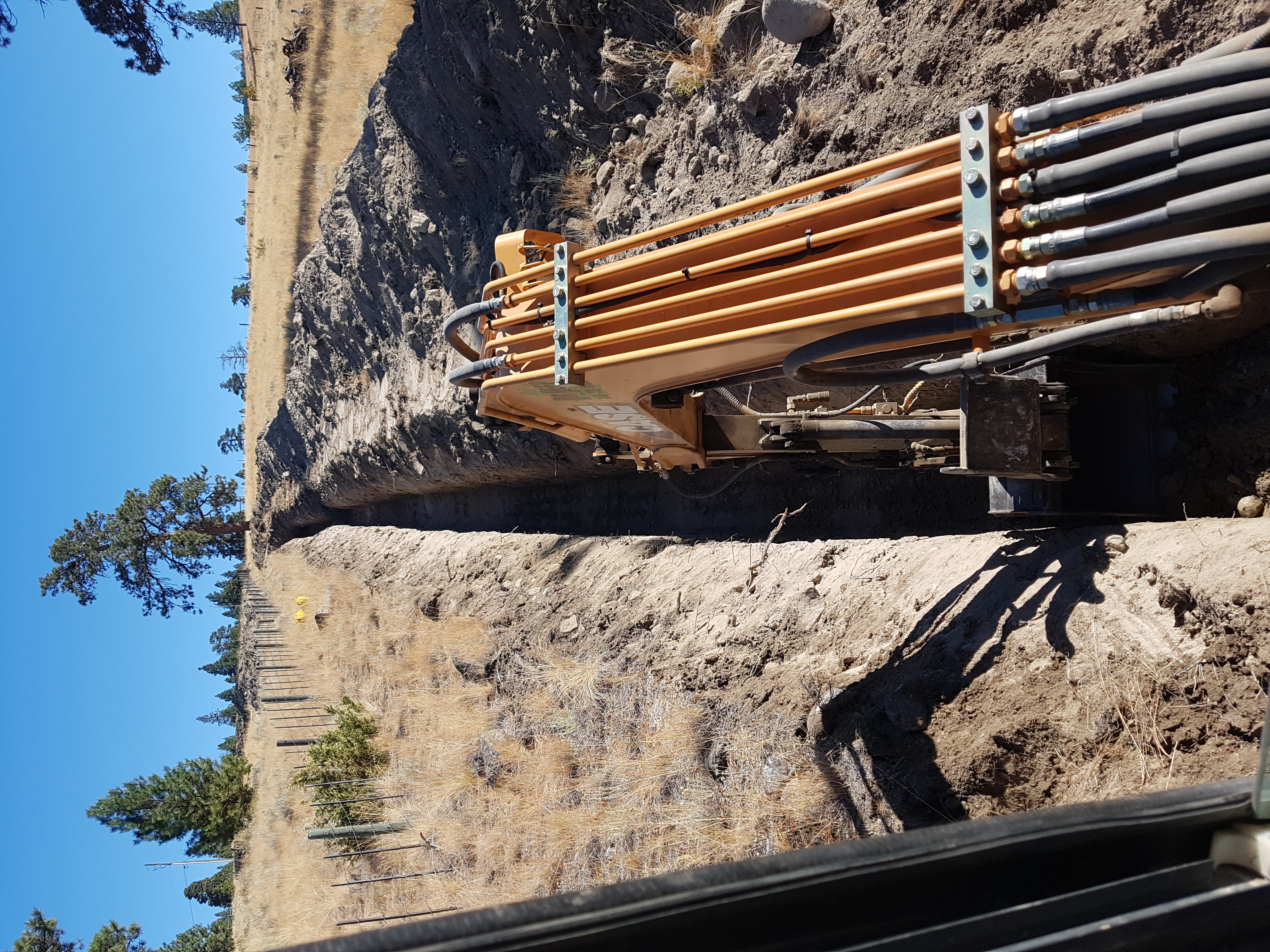 Water line install stump Lake.. dig and backfill